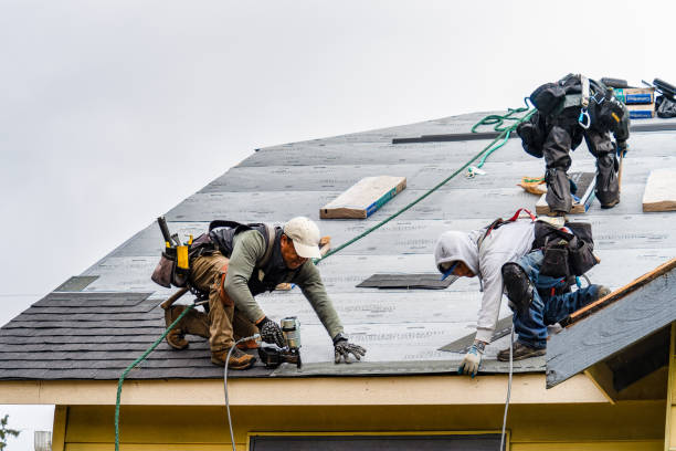 Professional Roofing technician working in Keuka Park, NY